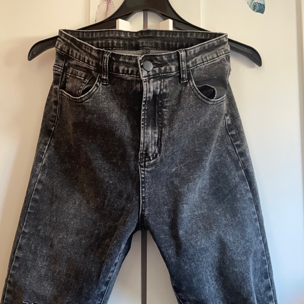Black wash ripped raw hem skinny jeans